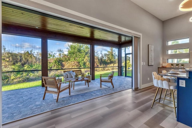 entryway featuring hardwood / wood-style flooring and a healthy amount of sunlight