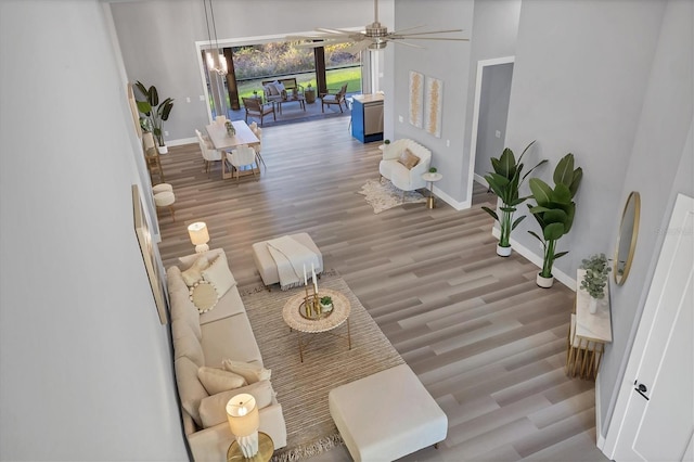 interior space featuring ceiling fan and hardwood / wood-style floors