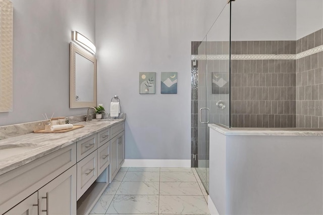 bathroom with a shower with door and vanity