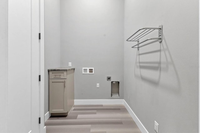 laundry room with hookup for a washing machine, electric dryer hookup, and light hardwood / wood-style floors