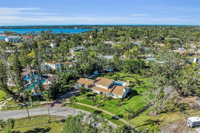 birds eye view of property featuring a water view