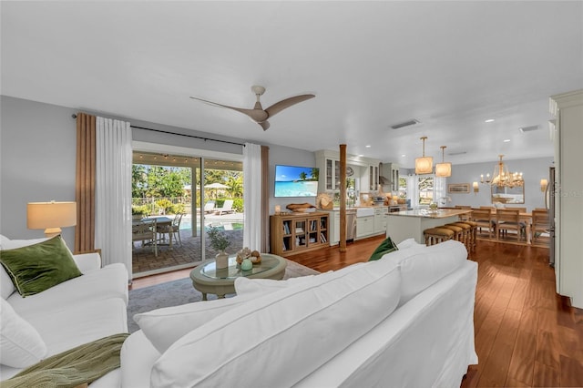 7820 Seville Cir, Bradenton, FL 34209 - living area featuring hardwood / wood-style flooring, a chandelier, recessed lighting, and ceiling fan