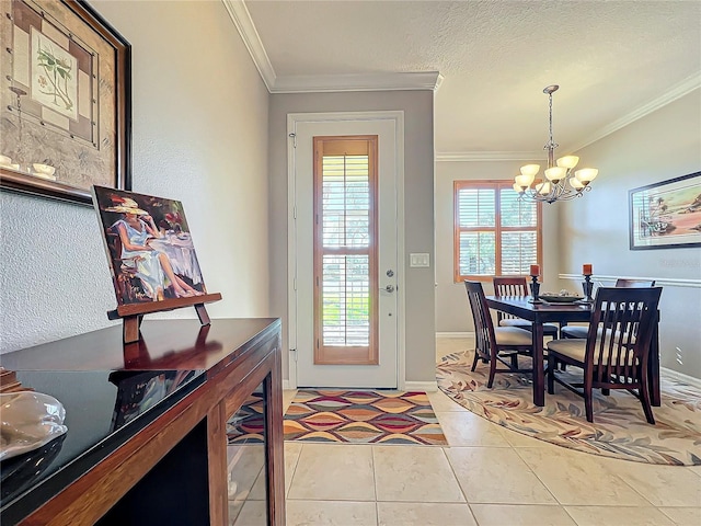 dining room featuring a chandelier, crown molding, baseboards, and light tile patterned flooring