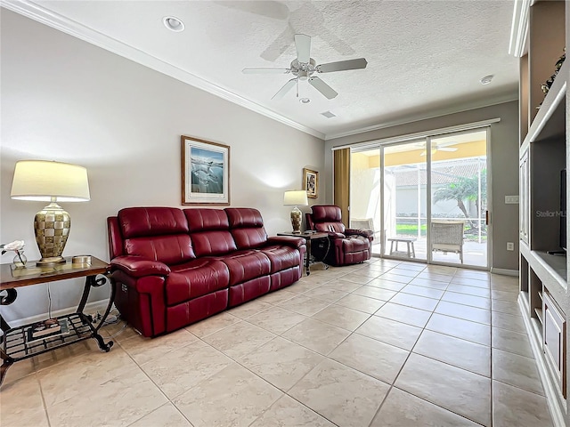 living room featuring ornamental molding, a textured ceiling, light tile patterned floors, baseboards, and ceiling fan