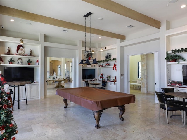 rec room featuring pool table, beam ceiling, and built in features