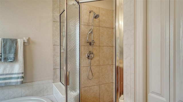 bathroom with a shower with shower door