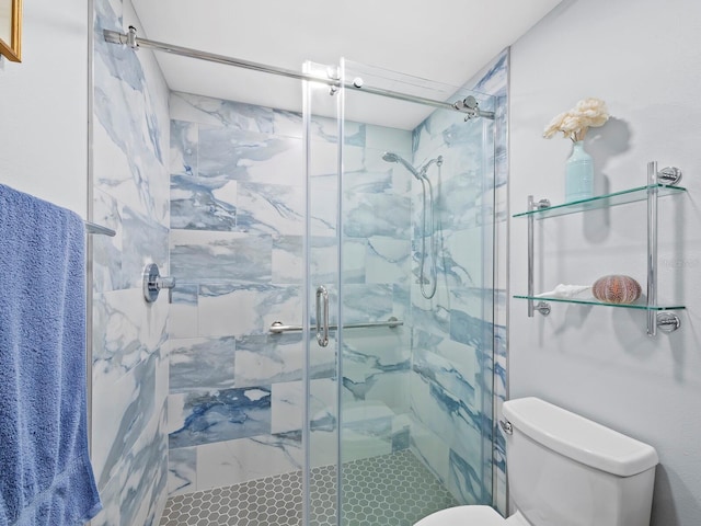 bathroom with walk in shower and toilet