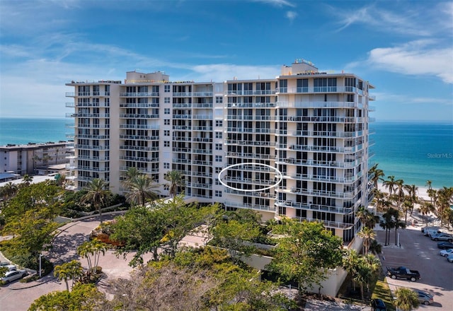 view of building exterior featuring a water view