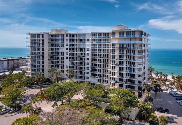 view of building exterior featuring a water view