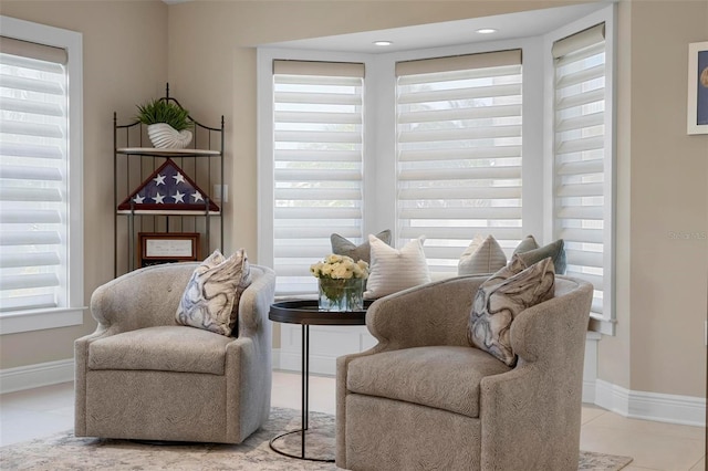 sitting room with light tile patterned floors