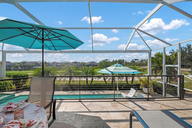 view of patio / terrace with glass enclosure