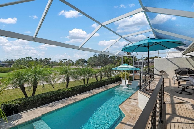 view of pool featuring a patio and a lanai