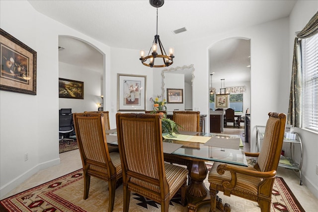 dining room featuring an inviting chandelier