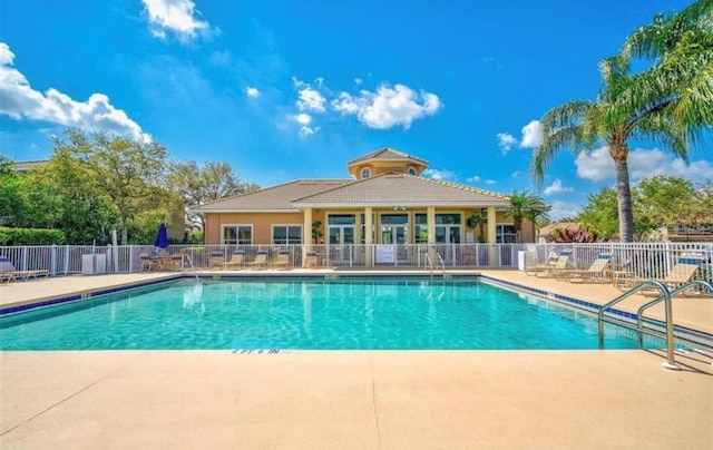 view of pool featuring a patio