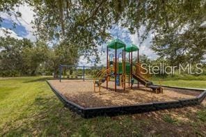 view of play area featuring a yard