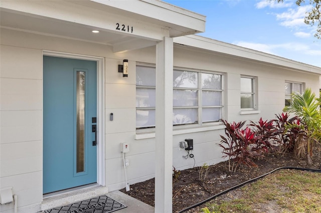 doorway to property featuring elevator