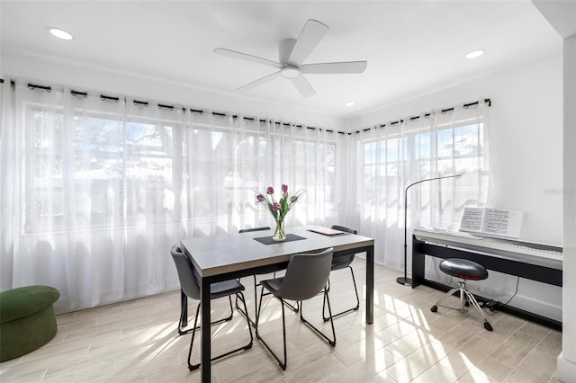 dining space with ceiling fan