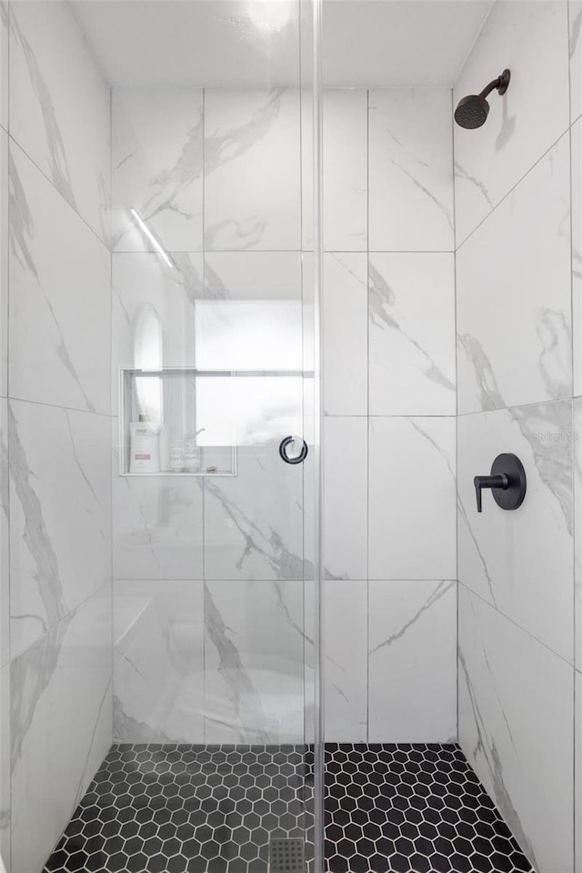 bathroom with an enclosed shower