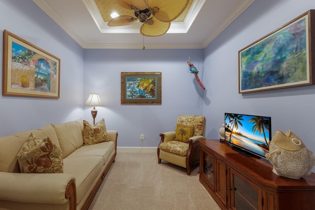 living area featuring a tray ceiling, light colored carpet, crown molding, and a skylight