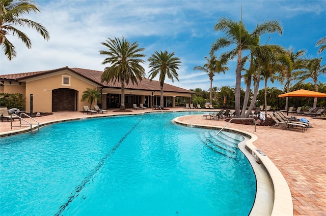 pool with a patio