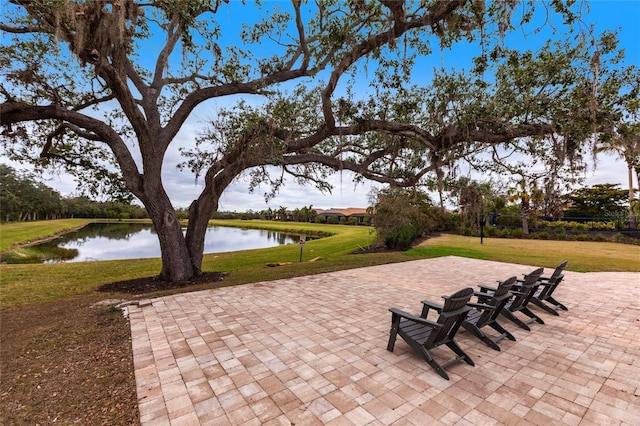 view of patio featuring a water view