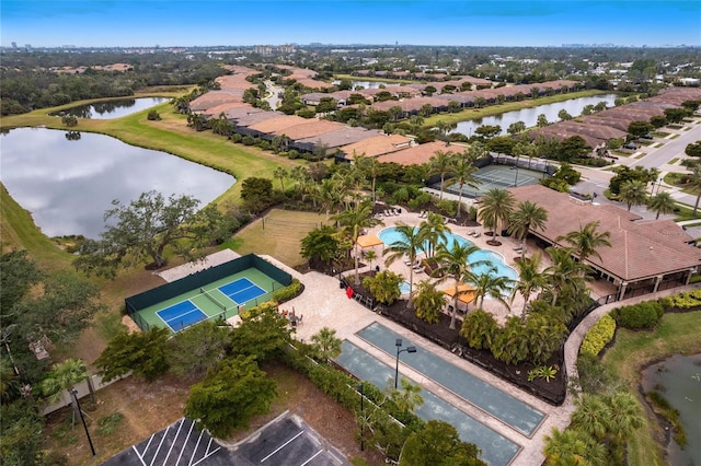 birds eye view of property featuring a water view