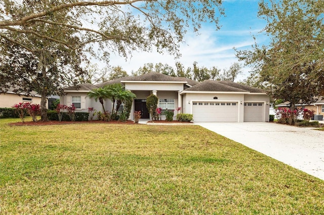 ranch-style home with a garage, driveway, a front lawn, and stucco siding