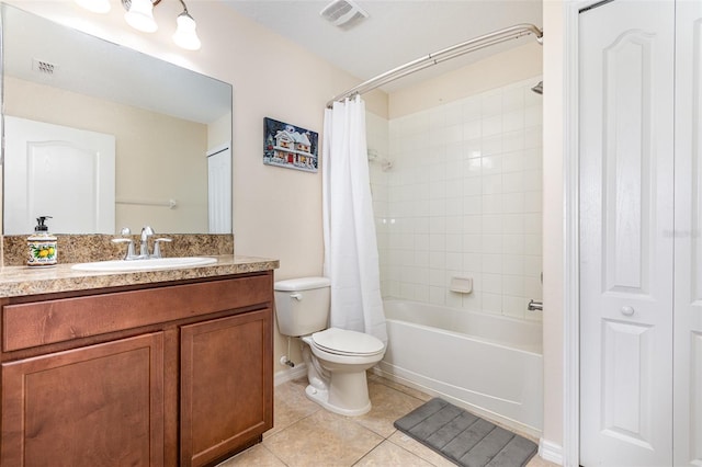 full bathroom featuring tile patterned flooring, visible vents, vanity, and toilet