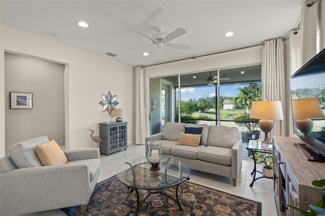 living room featuring ceiling fan