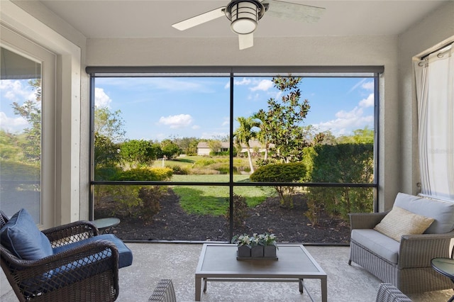 sunroom / solarium with ceiling fan