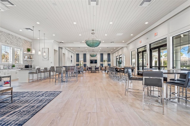 interior space with sink and wood ceiling