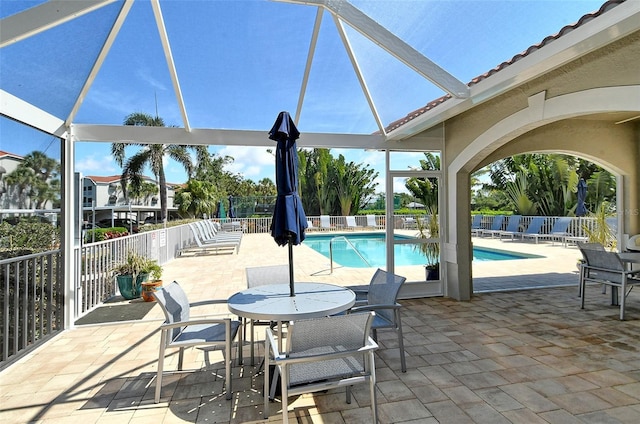 view of swimming pool with a patio