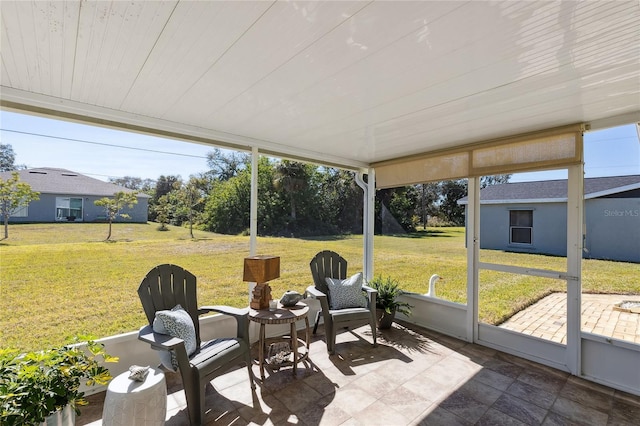 sunroom / solarium with wooden ceiling