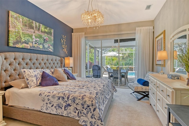 carpeted bedroom with access to exterior and a chandelier