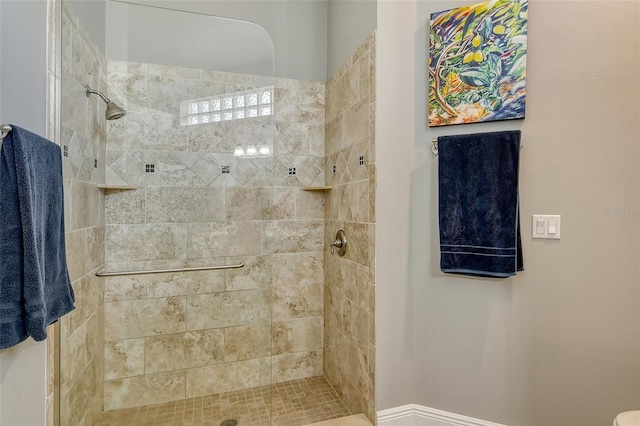 bathroom featuring tiled shower