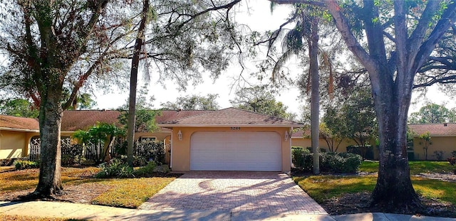 single story home with a garage