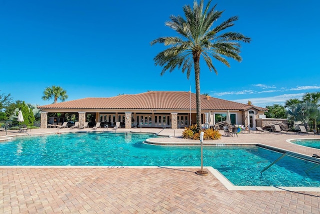 pool with a patio