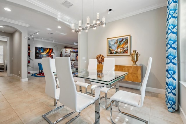 dining area featuring arched walkways, visible vents, crown molding, and light tile patterned flooring