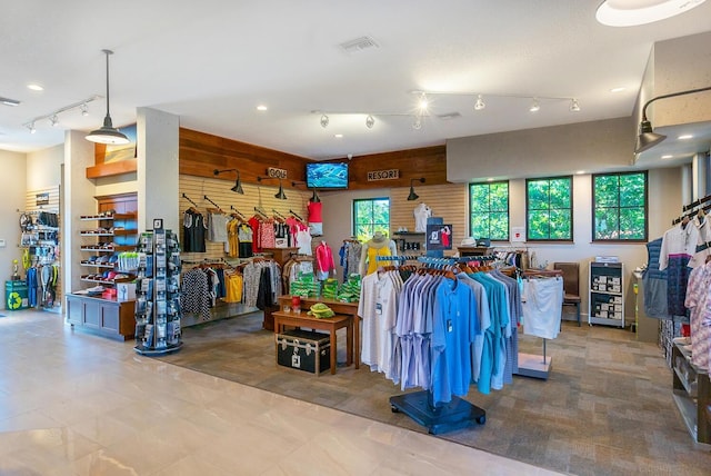 interior space featuring wood walls and visible vents