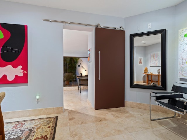 sitting room featuring a barn door