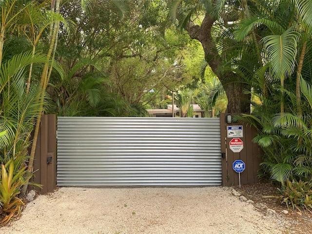 view of gate with fence