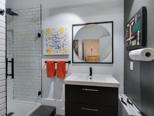 full bathroom featuring a stall shower and vanity