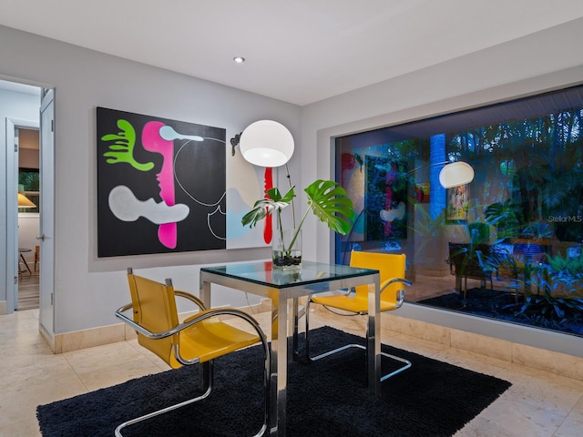 dining room with recessed lighting, baseboards, and tile patterned floors