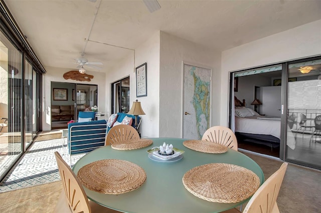 dining room with a ceiling fan