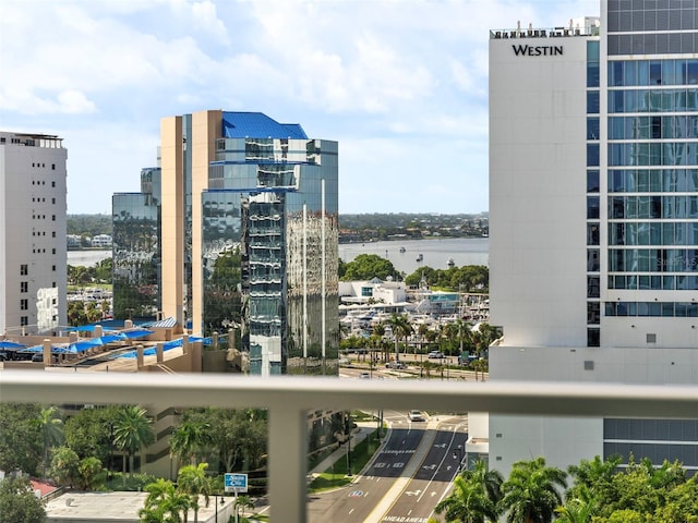 property's view of city featuring a water view