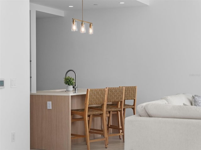 dining space with wood finished floors