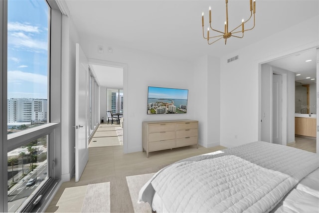 bedroom with expansive windows, baseboards, visible vents, and a notable chandelier