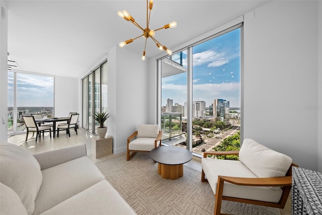 interior space featuring plenty of natural light, a view of city, and a notable chandelier