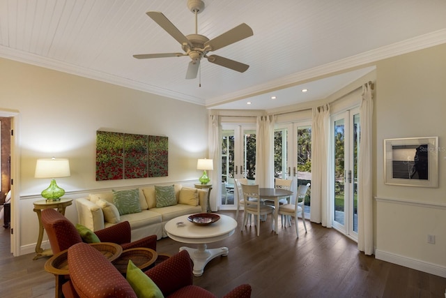 living room featuring baseboards, wood finished floors, crown molding, and french doors