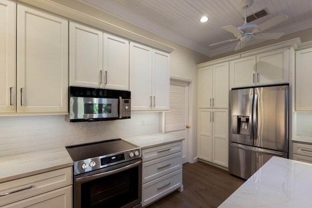 kitchen featuring ornamental molding, appliances with stainless steel finishes, visible vents, and tasteful backsplash